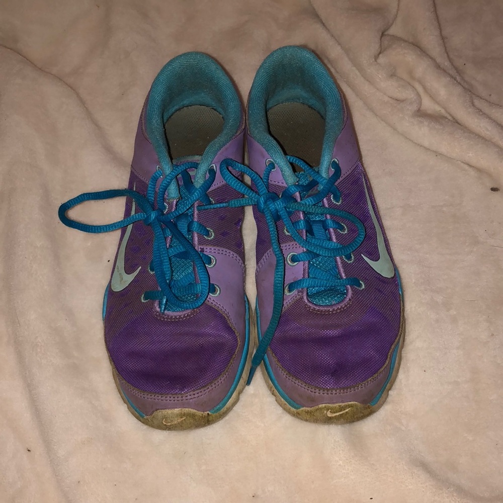 Blue and purple Nike shoes